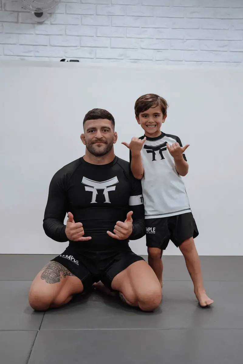 Coach and child training together at Temple BJJ — Kids with Parents program in Mooloolaba